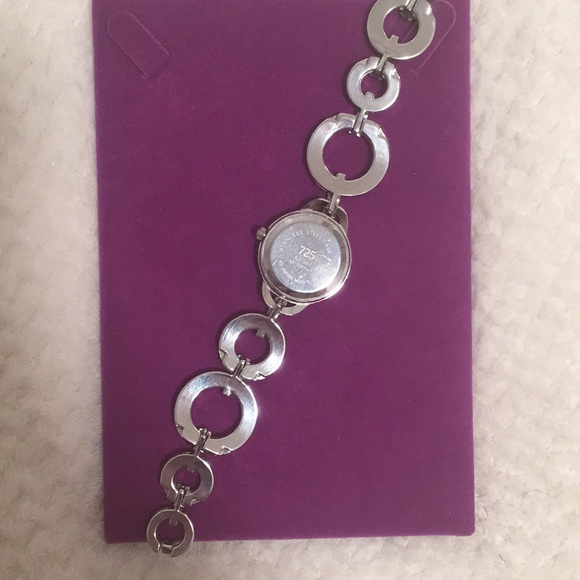 Silver toned watch. Walmart. 6 3/4 inches long. Used, like new. - Picture 4 of 5